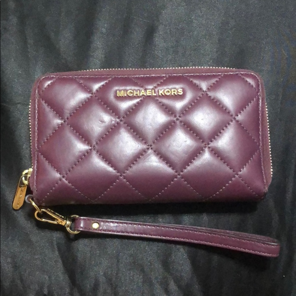 Michael Kors jet set quilted plum wristlet